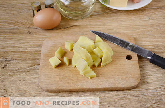 Pommes de terre à la coque avec un œuf dans une casserole - un plat nourrissant de 