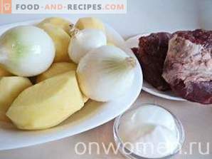 Viande avec pommes de terre en pots au four